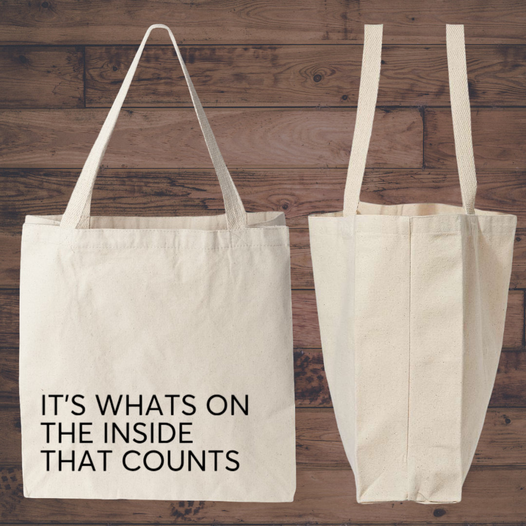 It’s What’s On The Inside’ canvas tote bag – unisex shoulder bag with bold slogan print