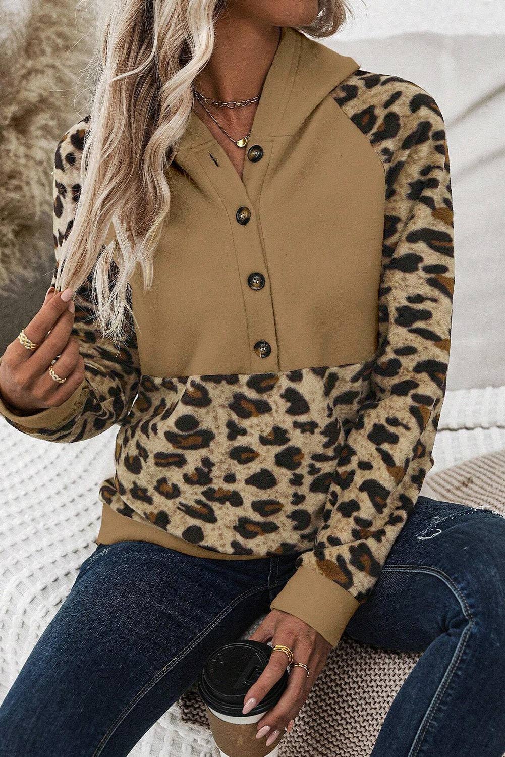 Tan hoodie with leopard raglan sleeves and front patchwork side