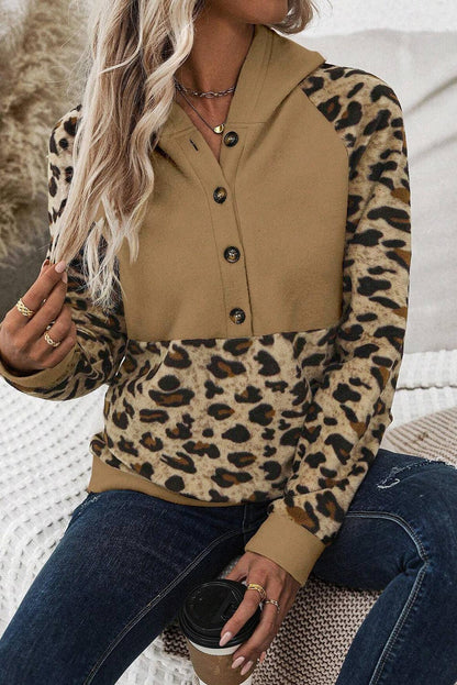 Tan hoodie with leopard raglan sleeves and front patchwork side